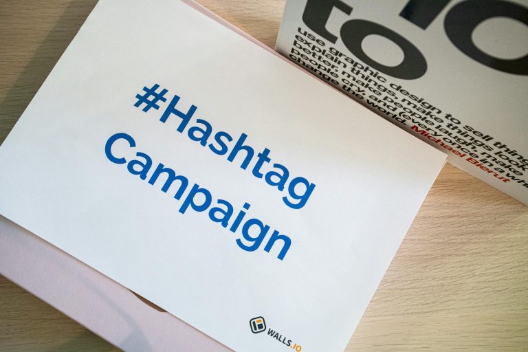 A concept image of a hashtag campaign displayed on paper for marketing strategies.